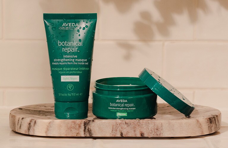 Product imagery of botanical repair™ intensive strengthening masques in light and rich.