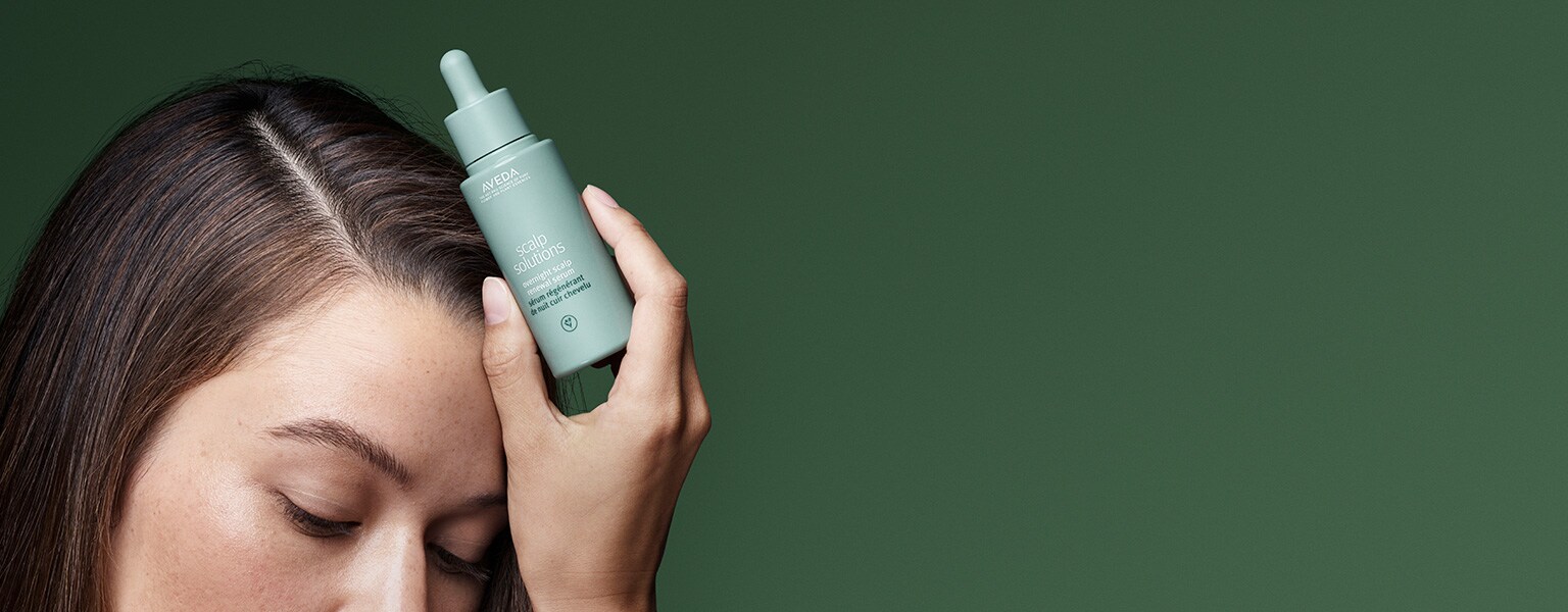 Shop Aveda's scalp solutions overnight scalp renewal serum improving scalp hydration by 51% in one night.